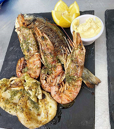 Gambas proposées au patio du restaurant du camping Lodges Méditerranée à Vendres-Plage